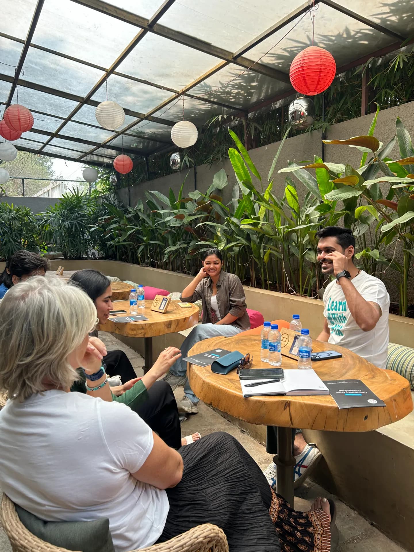 A group of COC members sharing a warm, candid moment at a community meetup